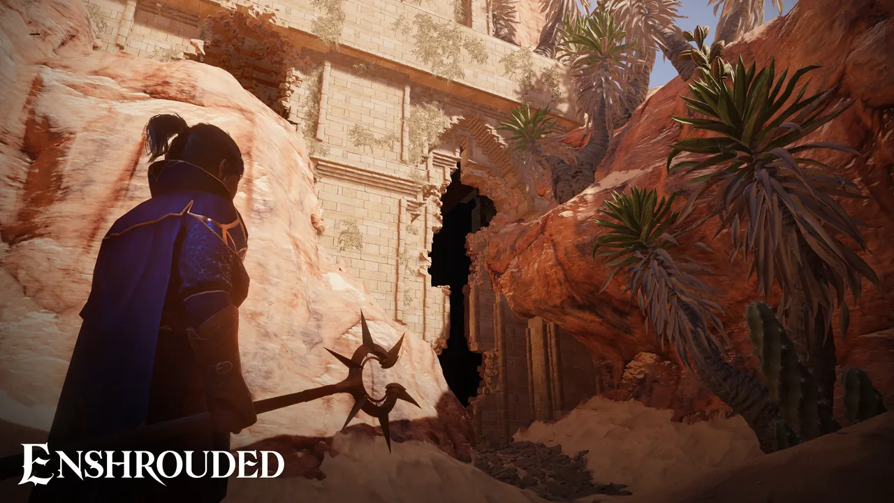 Flameborn wielding a spiked staff beside a sandstone ruin